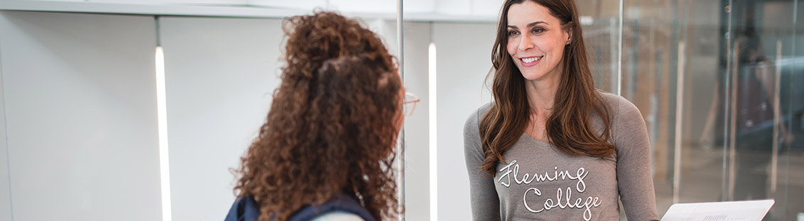 Mature students talking on camps